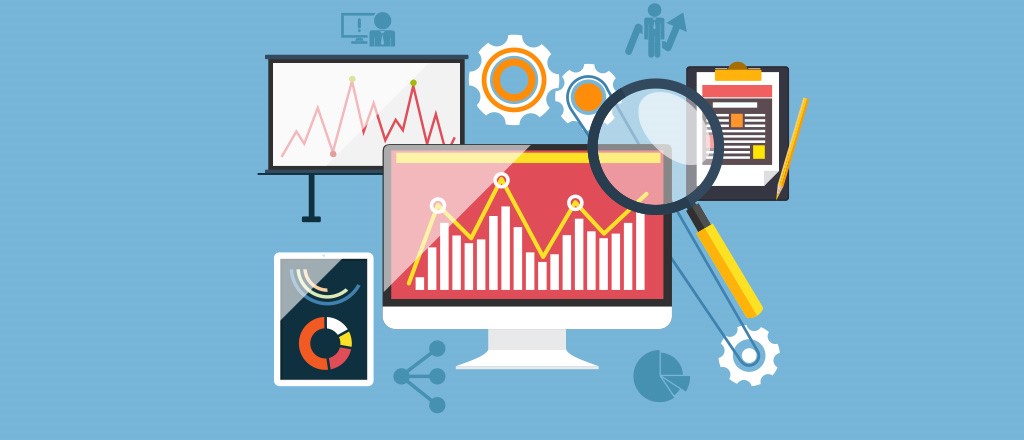 Monitor with magnifying glass and charts